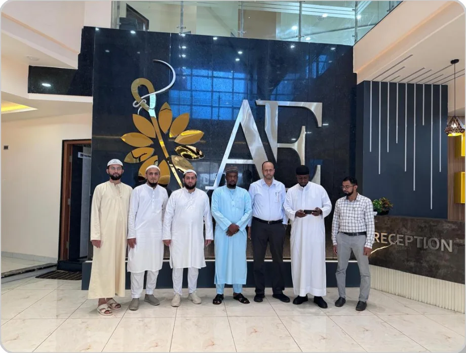 Managing Director, TM Yola Alh. Sagir Yusuf in a group photograph with the executive members of Ayesha Embroideries Textiles PVT Ltd. at Bangalore, Karnataka, India